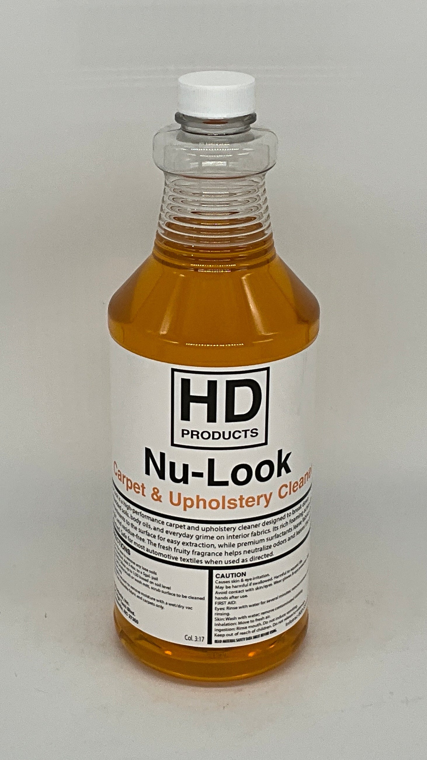 32oz Bottle of HD Products Nu-Look carpet and upholstery cleaner on a gray background