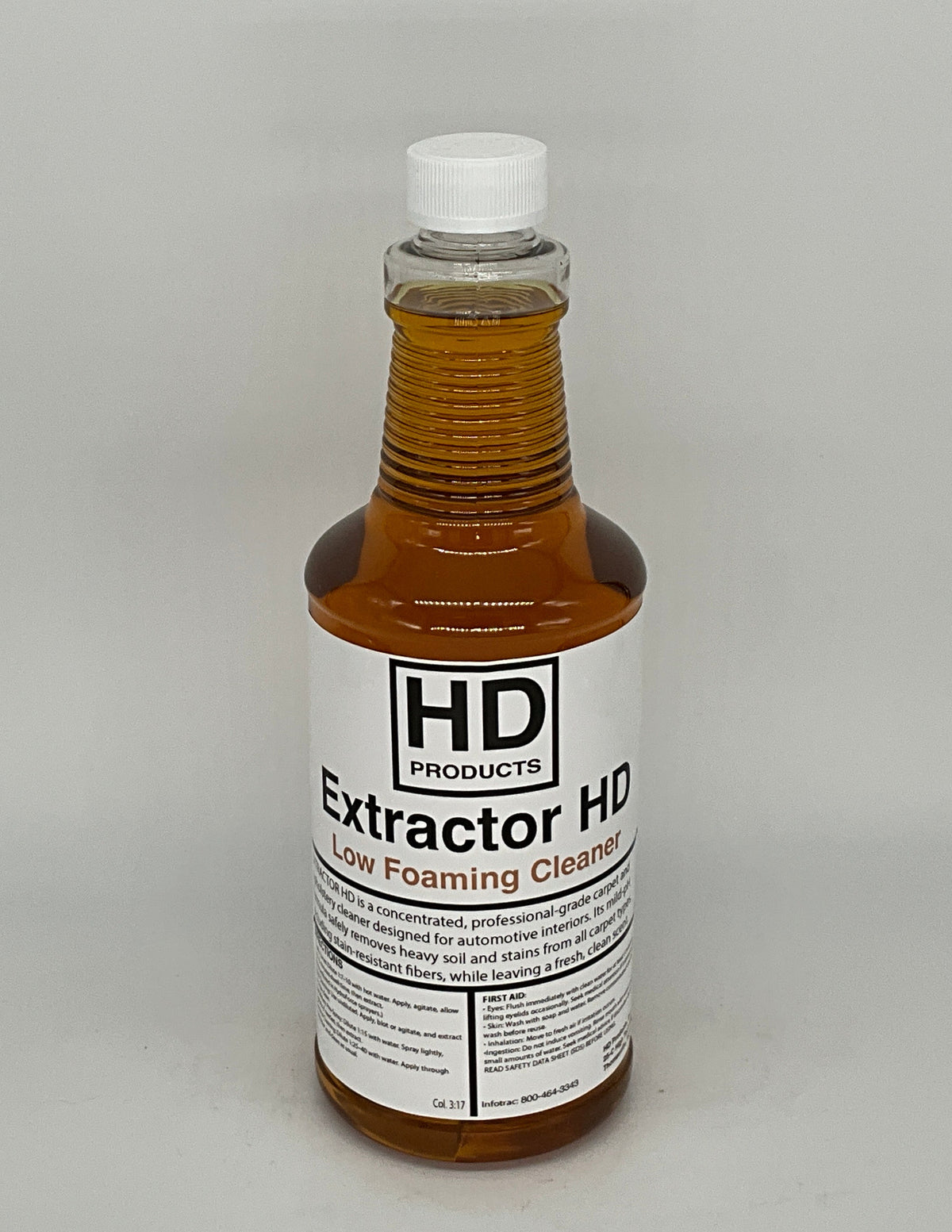 32oz Bottle of HD Extractor HD cleaning solution on a gray background