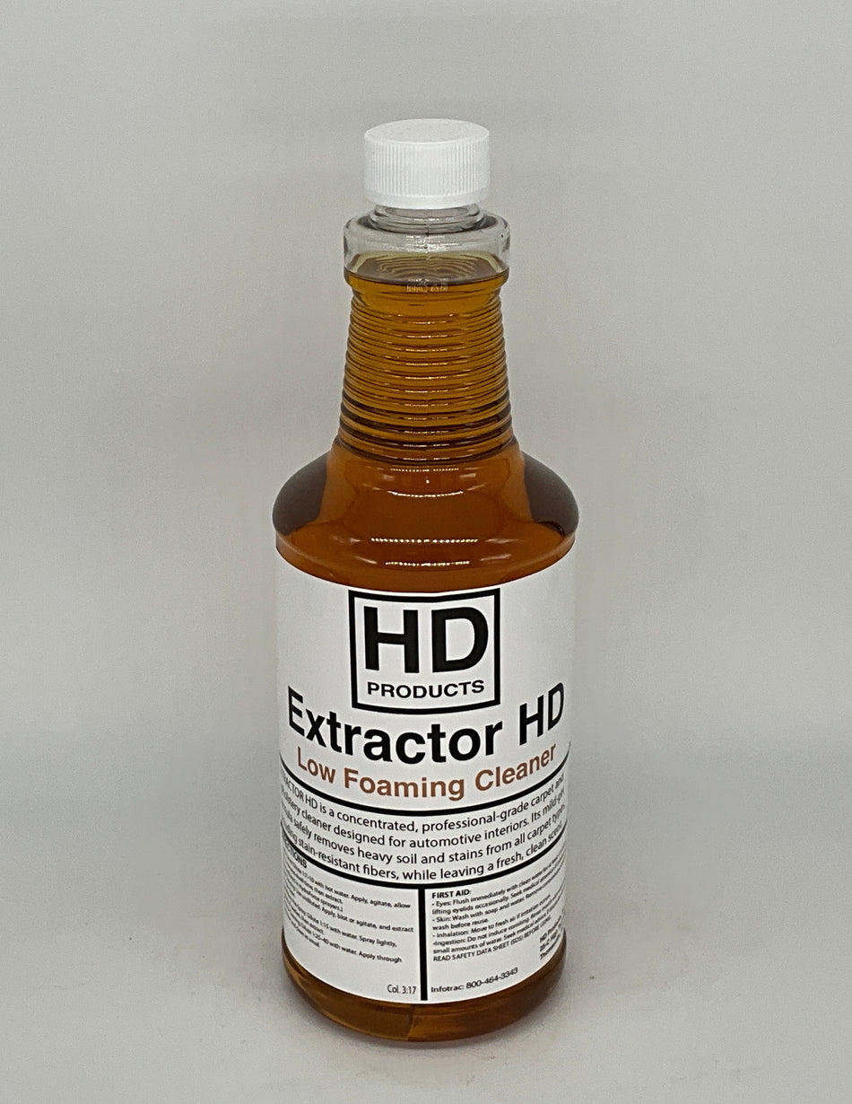 32oz Bottle of HD Extractor HD cleaning solution on a gray background