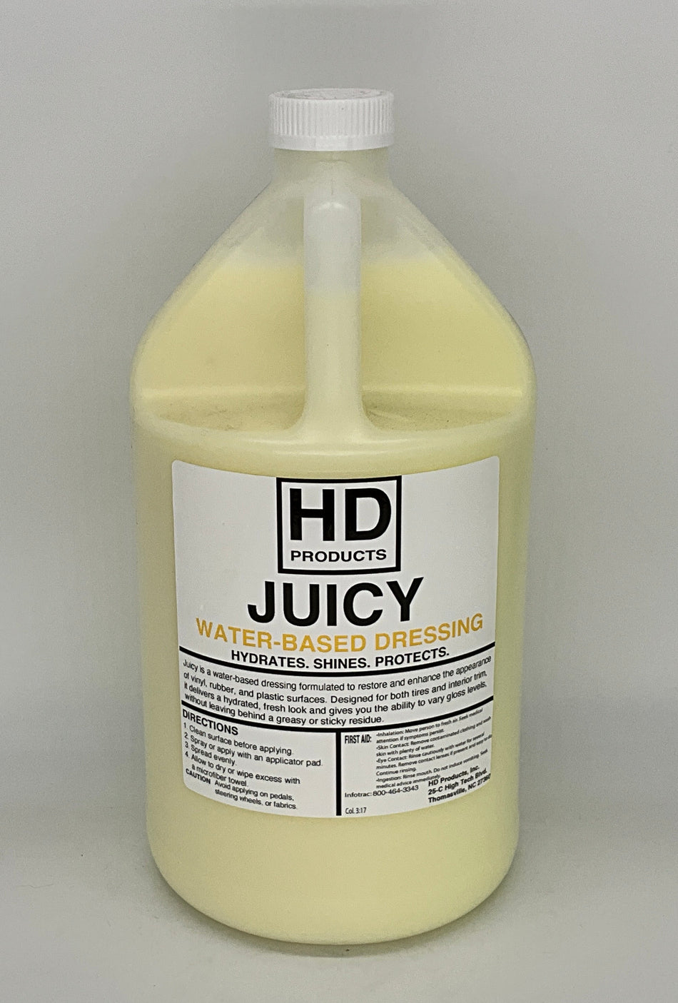 1 gallon bottle of HD Products Juicy water-based dressing on a gray background