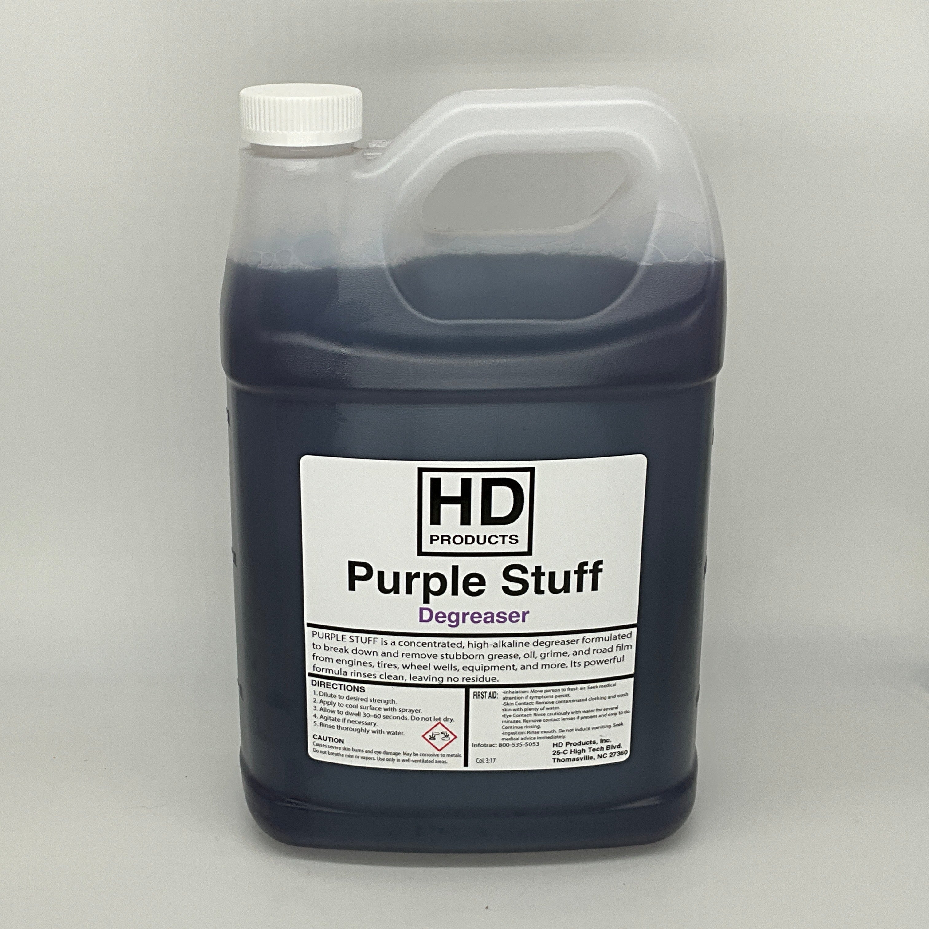 1 gallon Bottle of HD Products Purple Stuff Degreaser on a gray background