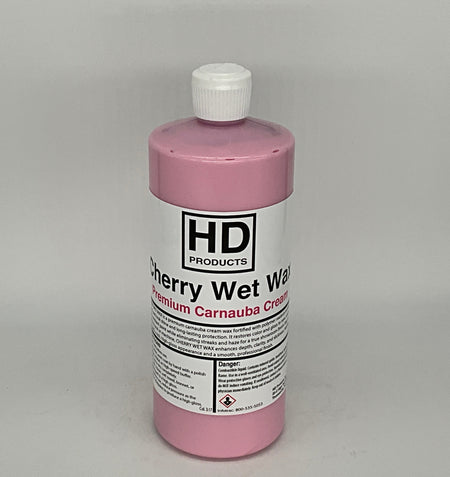32oz Pink bottle of HD Products Cherry Wet Wax on a gray background