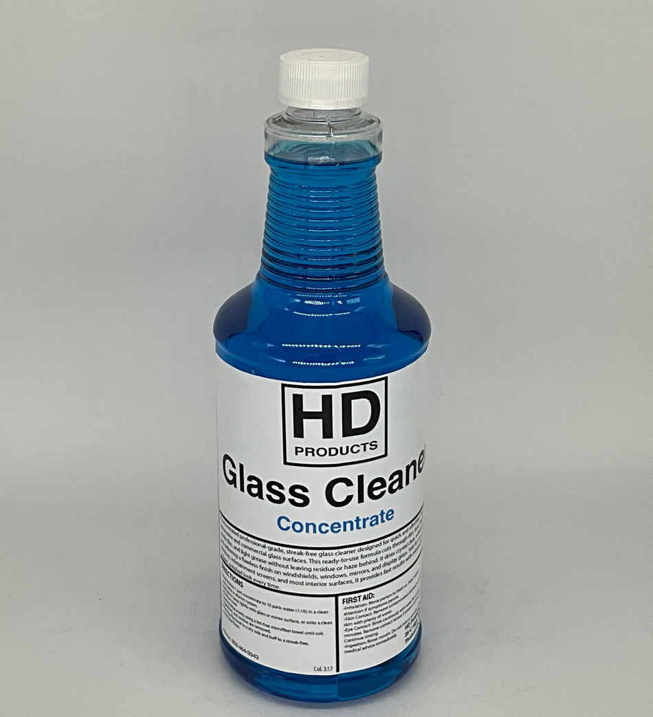 32oz  bottle of HD Products Glass Cleaner  blue on a gray background