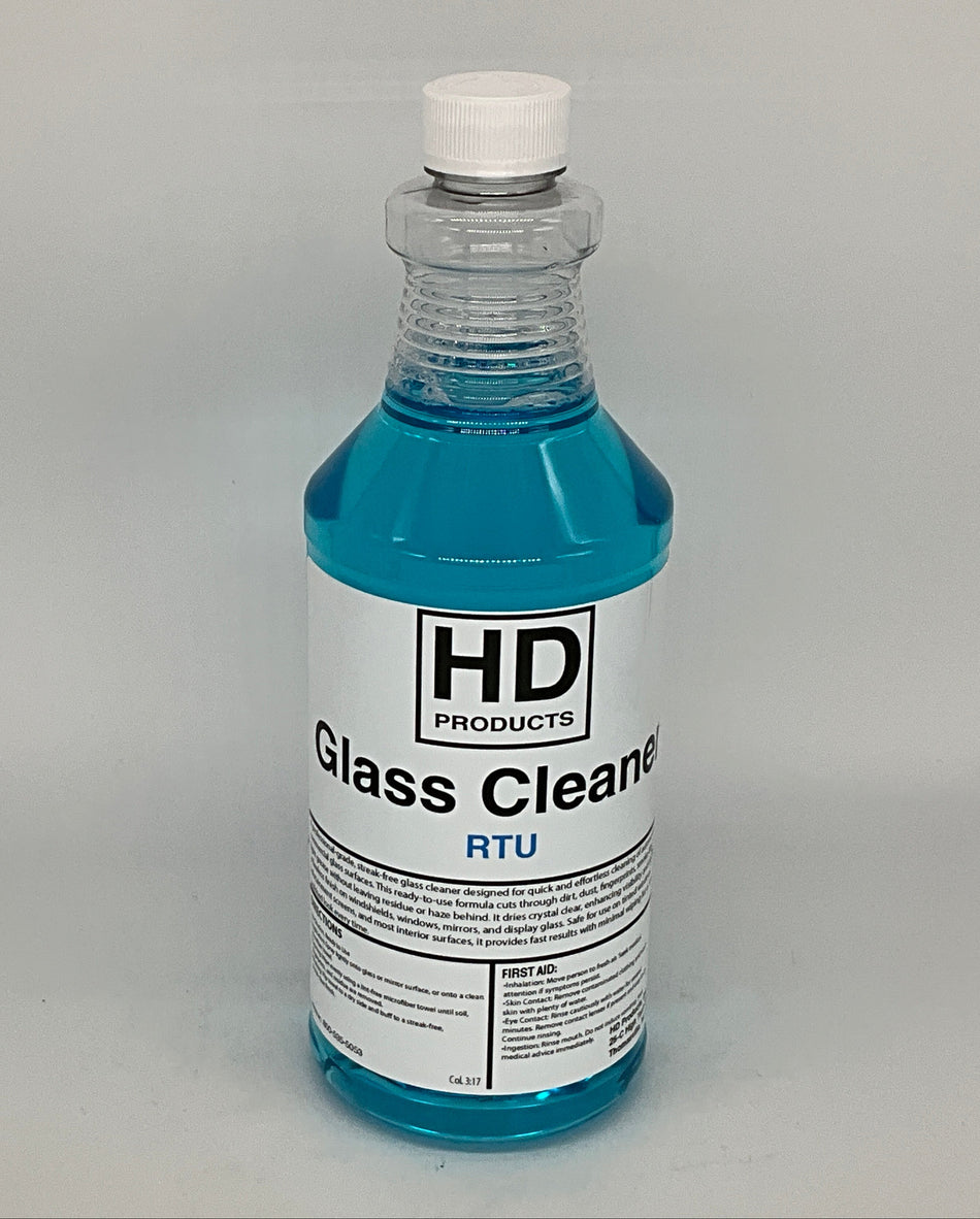 32oz Bottle of HD Products glass cleaner ready to use on a gray background