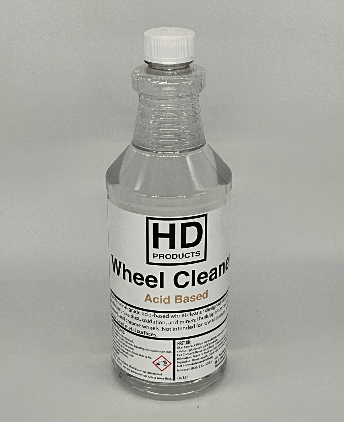 32oz Bottle of HD Products wheel cleaner on a gray background