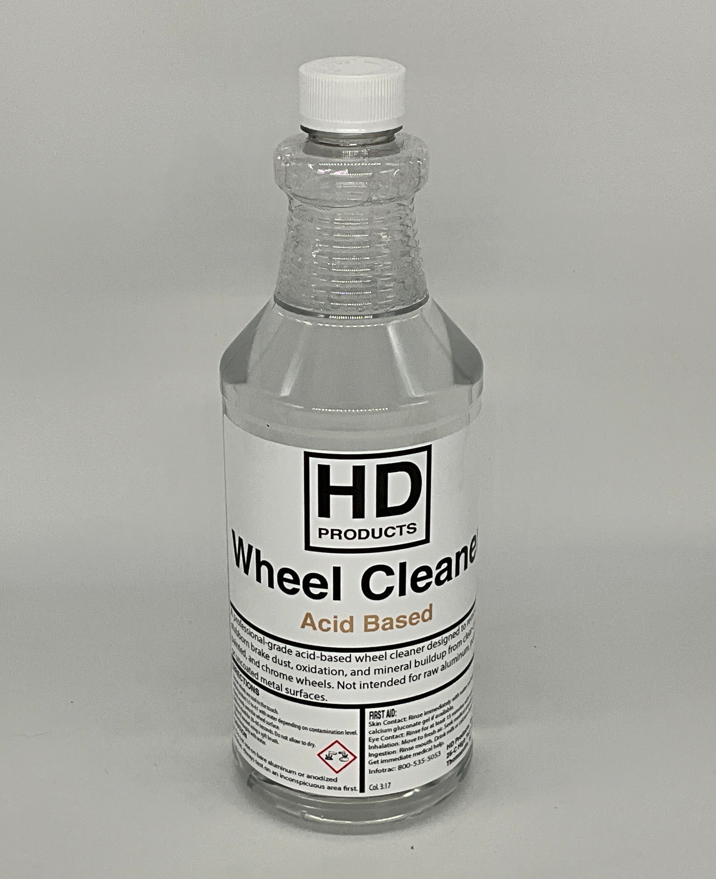 32oz Bottle of HD Products wheel cleaner on a gray background