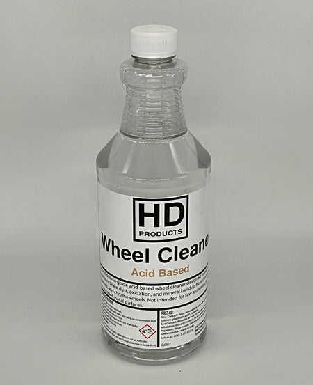 32oz Bottle of HD Products wheel cleaner on a gray background